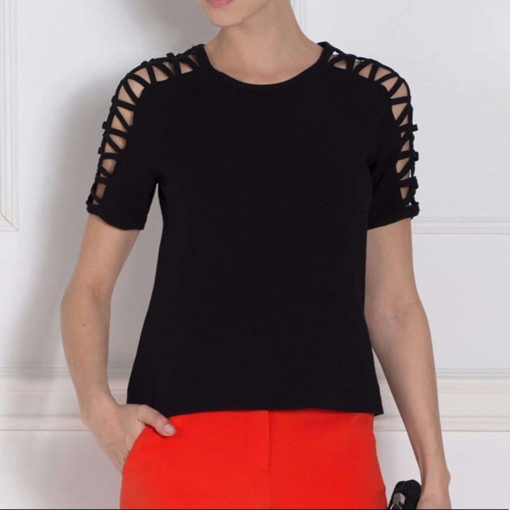 Black top with details on the sleeves